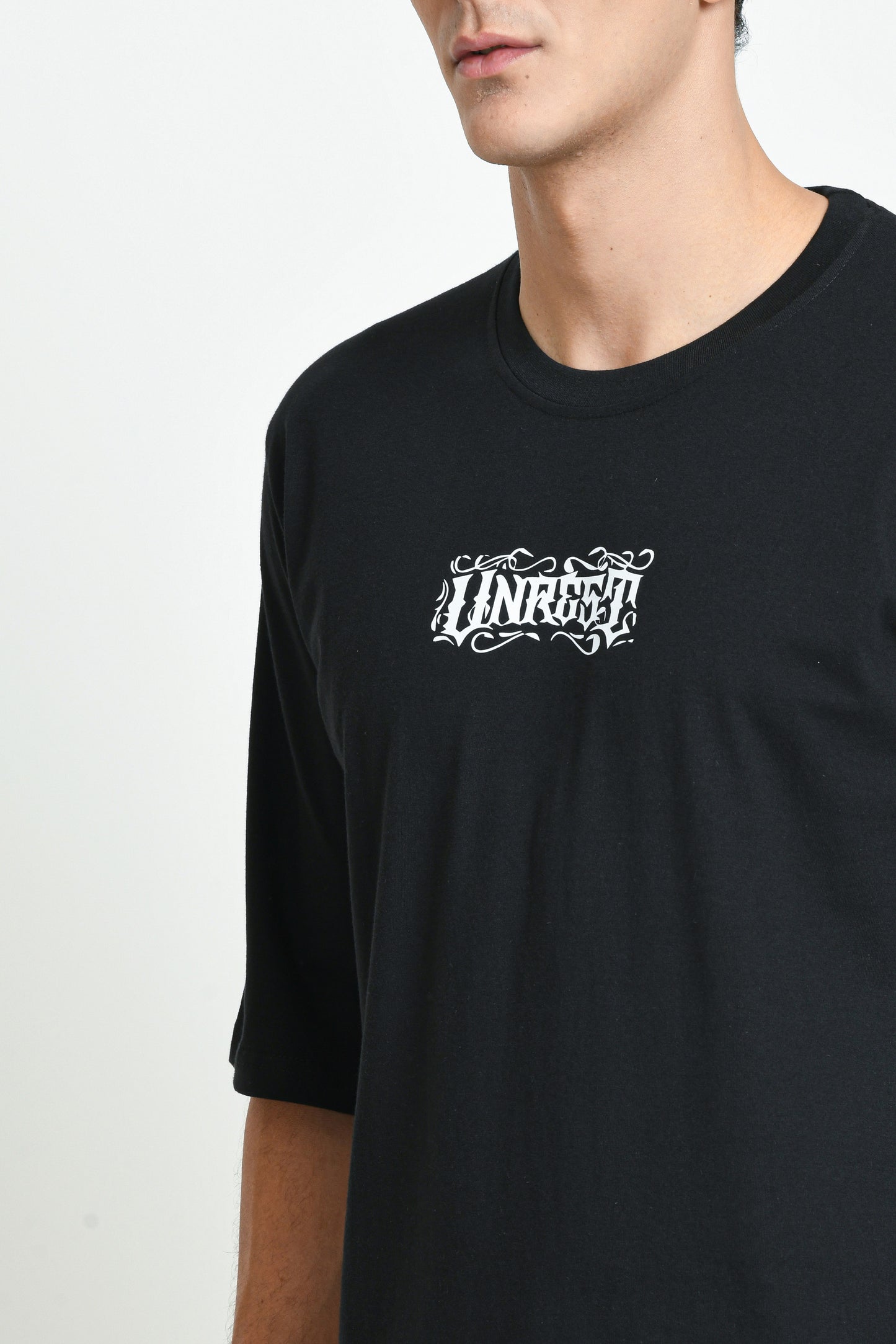 UNREST PRINTED OVERSIZED T-SHIRT